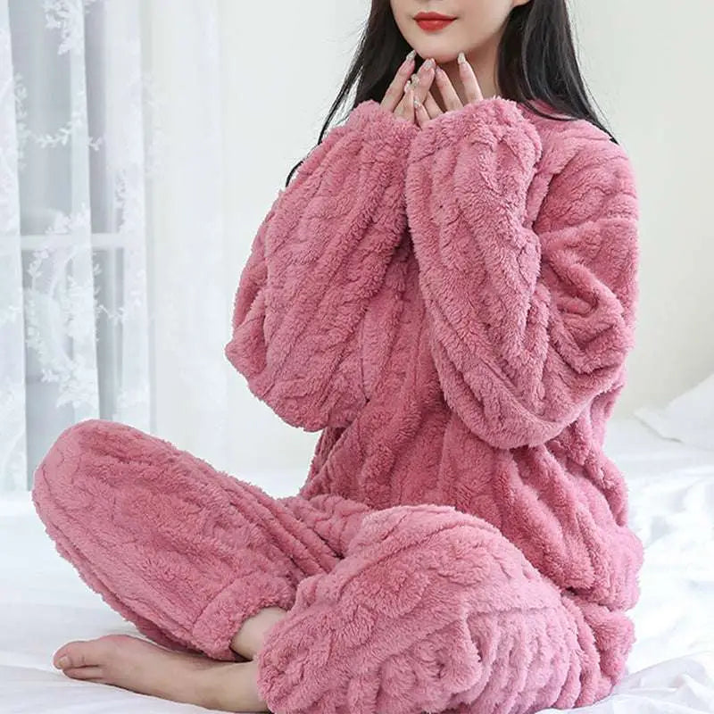 Pink plush fleece pajama set with thickened coral velvet and textured cable knit pattern for winter comfort