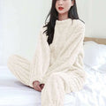 Cream-colored thickened coral velvet winter pajamas set with textured cable-knit plush material for warmth