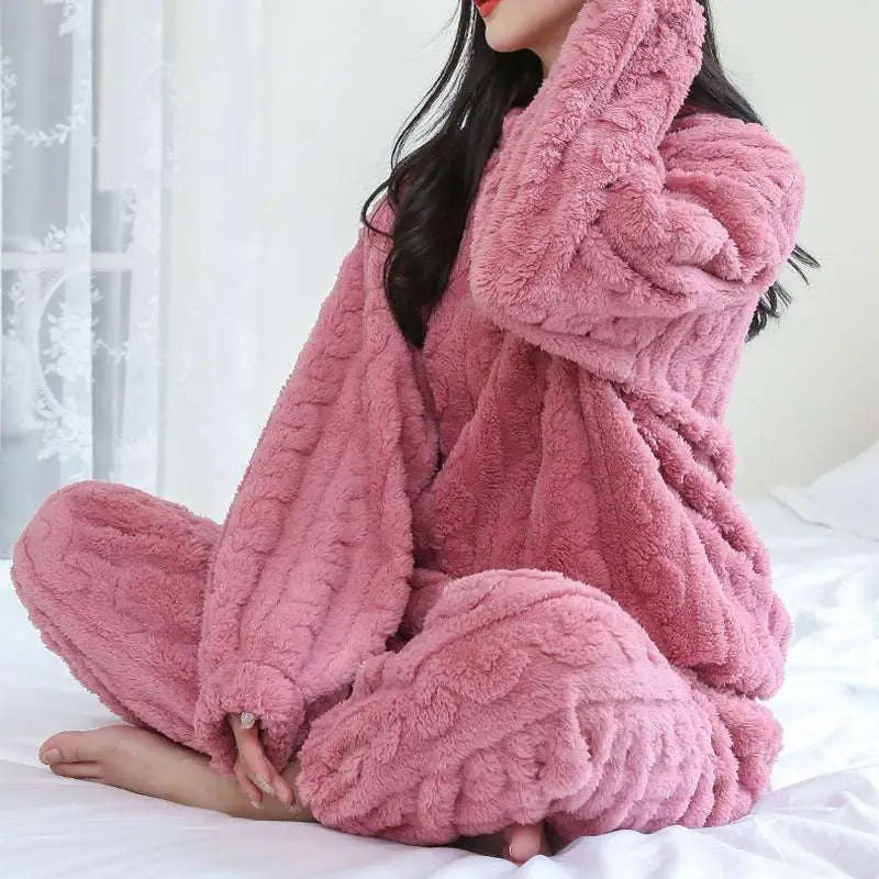 Pink plush knit pajama set with thickened coral velvet and textured cable-knit pattern for winter comfort