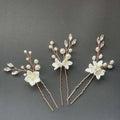 Elegant three sets of white flower u shaped hairpins with clear crystals pearls and rose gold silver wire stems