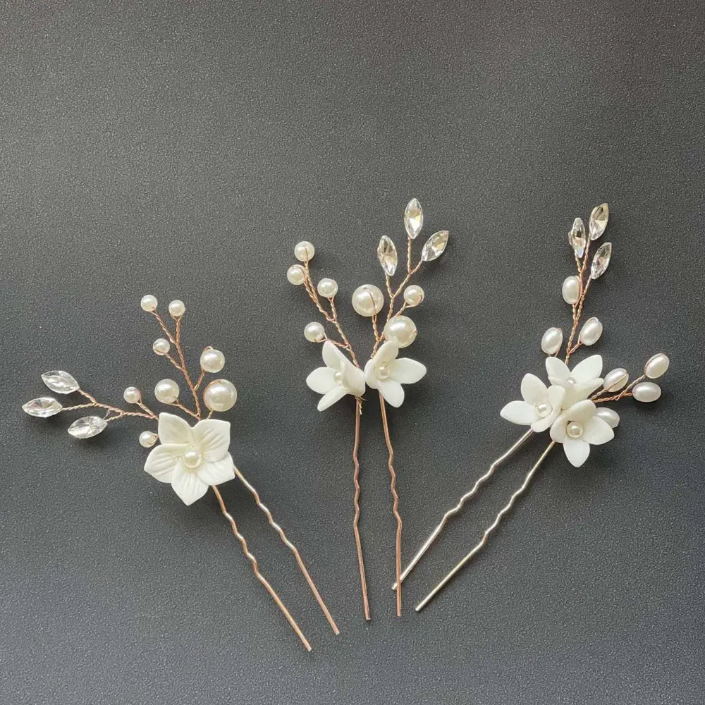 Elegant three sets of white flower u shaped hairpins with clear crystals pearls and rose gold silver wire stems