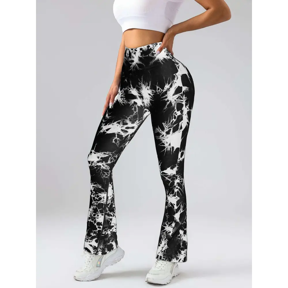 Black and white tie dye tummy control flare yoga pants with high waist and butt lift design for activewear