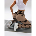 Tan and black tie dye tummy control flare yoga pants with mesh panel at the back for butt lift effect
