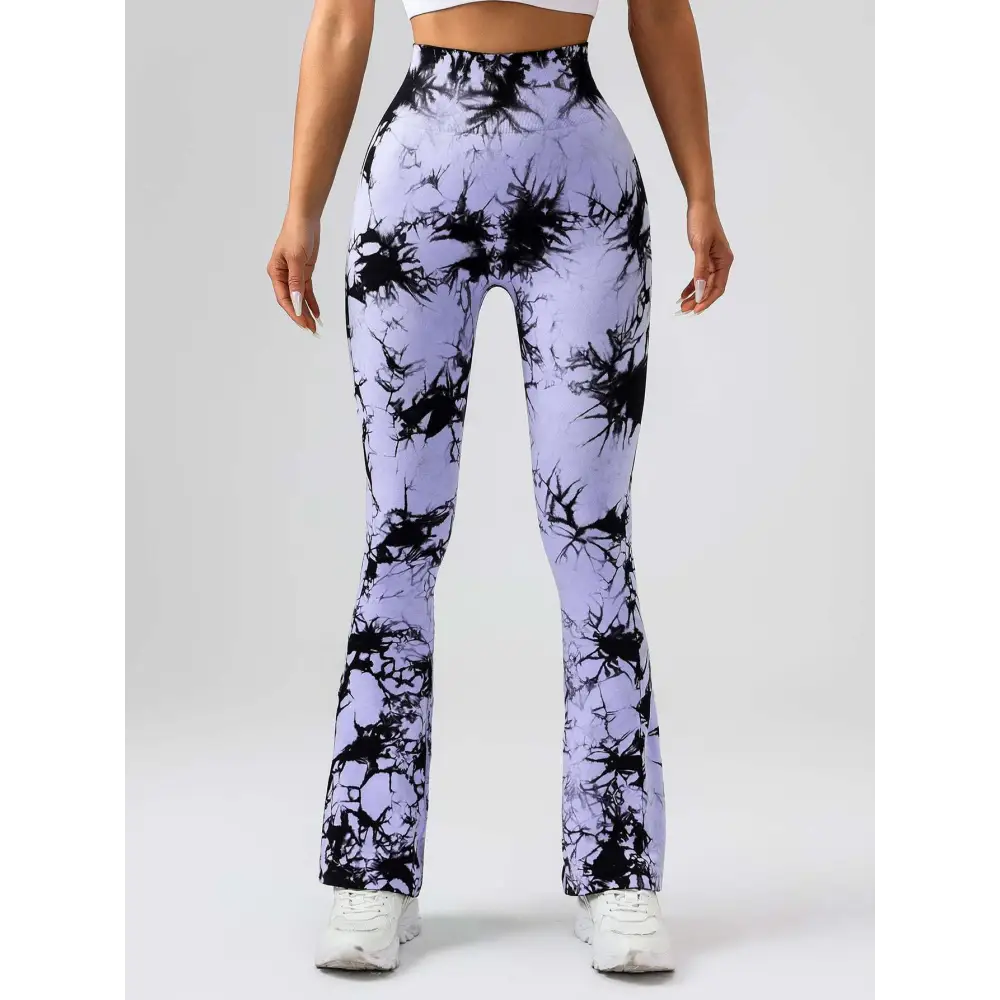 Purple and black tie dye tummy control flare yoga pants with high waist and butt lift design for activewear