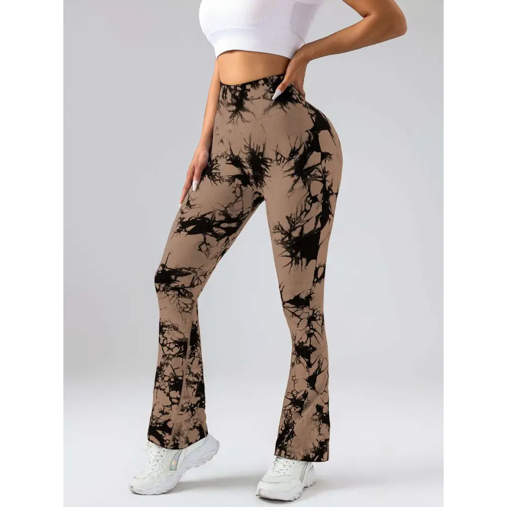 Tan and black tie dye tummy control flare yoga pants with butt lift designed for comfortable activewear
