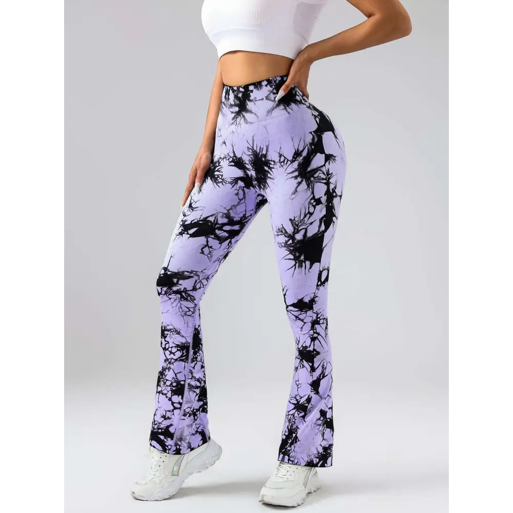 Purple and black tie dye tummy control flare yoga pants with high waist and butt lift design for active wear