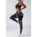 Black and white tie dye women’s scrunch butt yoga leggings with high-waisted, form-fitting design in butt yoga set