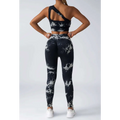 Black and white tie dye women’s scrunch butt yoga set featuring high-waisted leggings and one-shoulder crop top