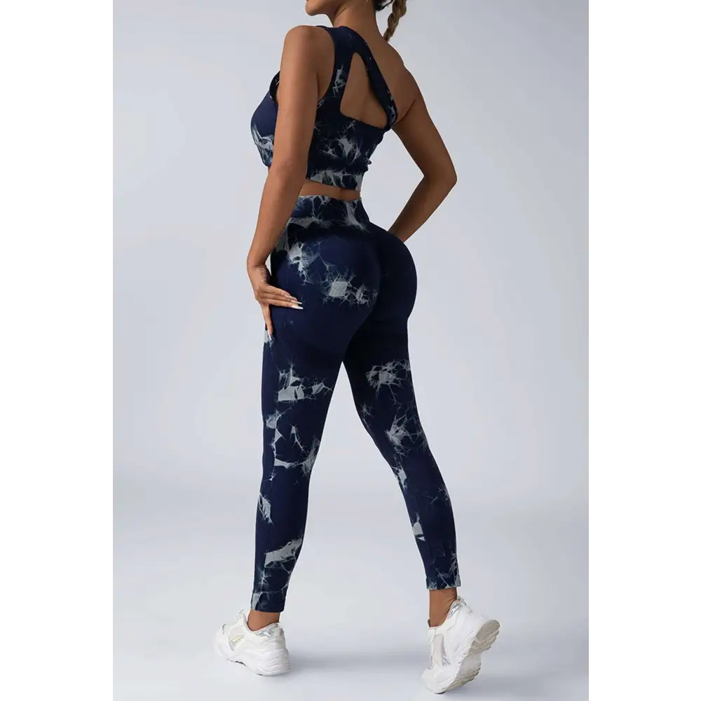 Navy blue and white tie dye women’s scrunch butt yoga leggings with high-waisted, form-fitting design in butt yoga set