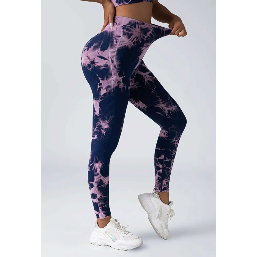 Purple and navy tie dye women’s scrunch butt yoga leggings with ribbed texture in a high waisted butt yoga set