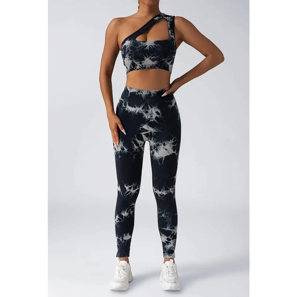 Black and white tie dye women’s scrunch butt yoga set with one shoulder crop top and high waisted leggings