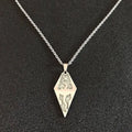 Silver diamond-shaped titanium steel luminous necklace with intricate dragon and flame cutouts on stainless steel chain couple jewelry
