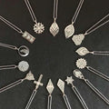 Silver-toned diamond-shaped titanium steel luminous necklace couple jewelry with intricate gears leaves hearts and symbols pendant