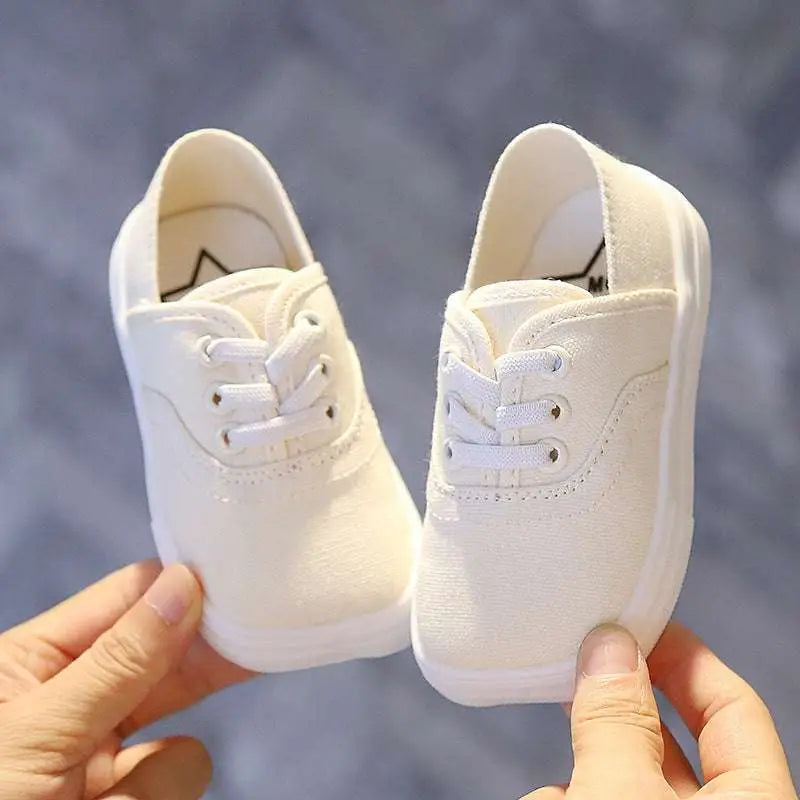 Toddler canvas shoes korean board style in white rubber with matching laces and a classic design