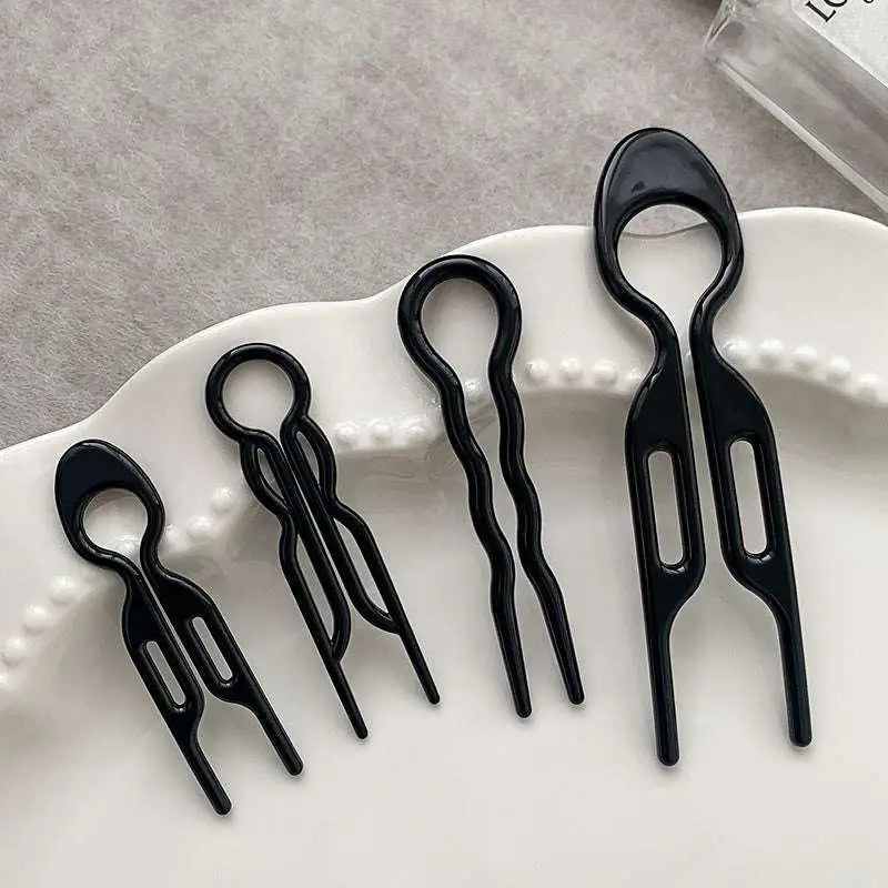 Set of five sleek black plastic hair clips with varied designs for tortoiseshell bun lazy and bun lazy styling gadgets