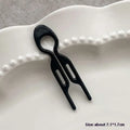 Black plastic lazy updo gadget hair clip with sleek modern design two prongs and oval handle for bun lazy styling