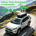 Black heavy-duty aluminum roof cargo box with tower feet mounted on white toyota rav4 roof rack cross bars