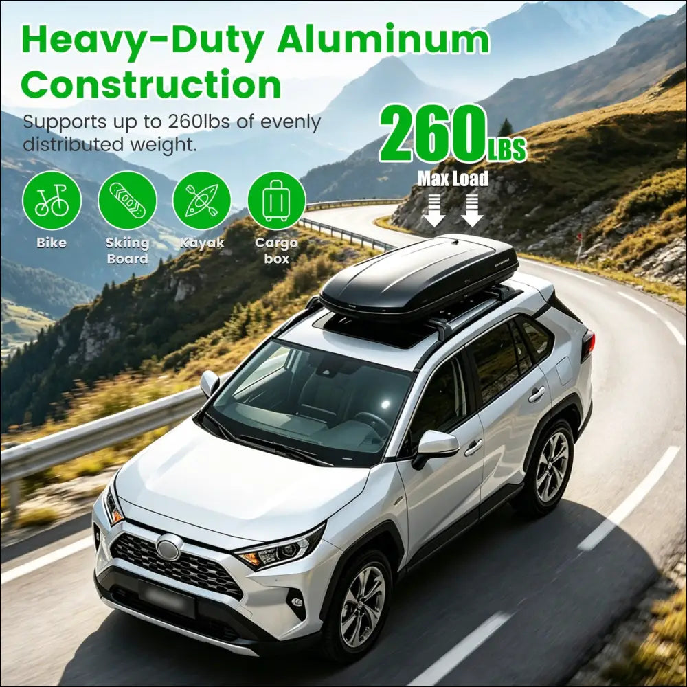 Black heavy-duty aluminum roof cargo box with tower feet mounted on white toyota rav4 roof rack cross bars