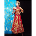 A vibrant red traditional chinese robes xiuhe wedding gown with gold embroidered phoenix and floral patterns