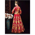 A vibrant red traditional robes xiuhe dress with intricate gold chinese dragon and floral embroidery and a high collar