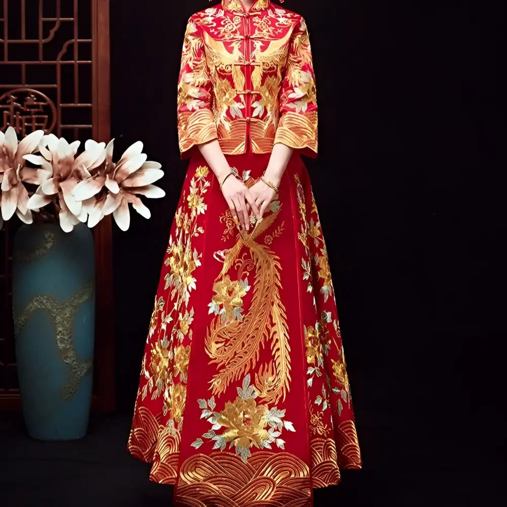 A vibrant red robes xiuhe wedding gown with intricate gold and silver chinese dragon and phoenix embroidery