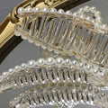 Clear acrylic pearl grab clip adorned with white pearls and rhinestone bow for elegant hair styling