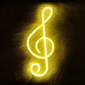 A glowing yellow neon bar light shaped like a treble clef for the treble clef blue neon collection