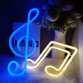 Blue and yellow neon bar lights shaped like a treble clef and an eighth note in treble clef blue neon design
