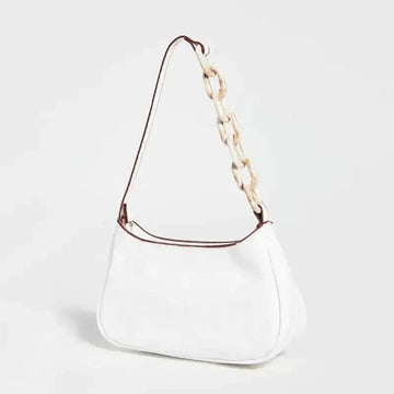 Trendy small crocodile white leather shoulder bag with contrasting brown trim and off-white acrylic chain strap