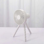 White tripod small fan with adjustable multifunctional desktop stand for cooling in various settings