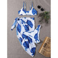 White and blue tropical leaf bikini printed three-piece set swimsuit with matching wrap skirt for beachwear