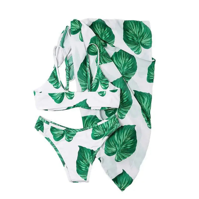 White bikini printed three-piece set swimsuit featuring vibrant green tropical leaf pattern for beachwear