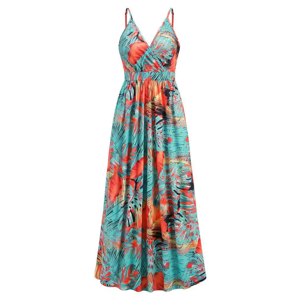 A vibrant tropical leaf print summer swing dress with spaghetti straps and a v-neckline in teal coral and orange