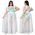 A plus-size woman wears a fashionable temperament mesh plus size tropical leaf mesh sheer white maxi dress with turquoise sequins