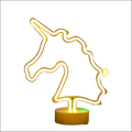A glowing yellow neon unicorn head lamp with minimalist design and warm base tropical nights neon night light