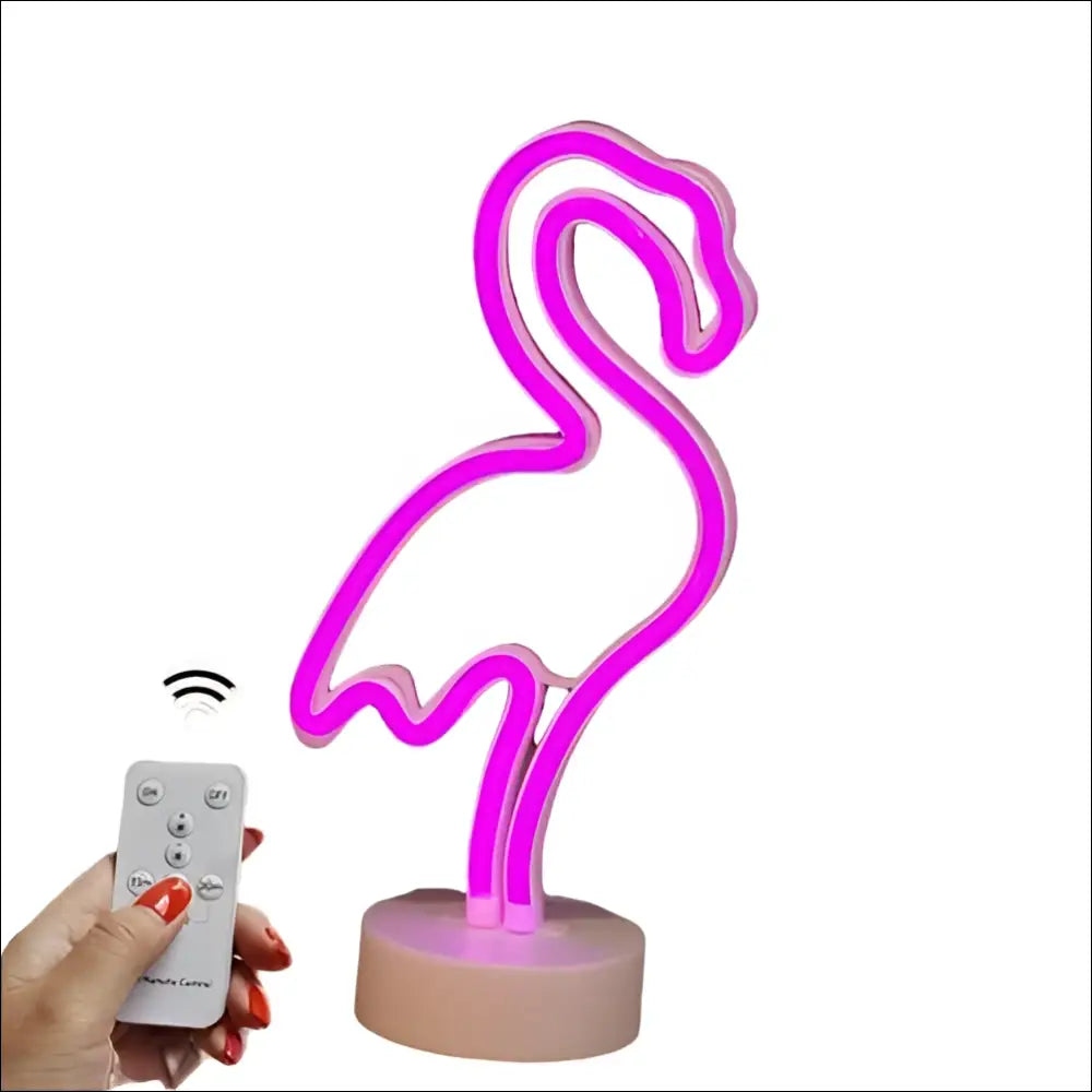 A vibrant pink tropical nights neon flamingo night light with neon deco design and soft beige base for indoor use