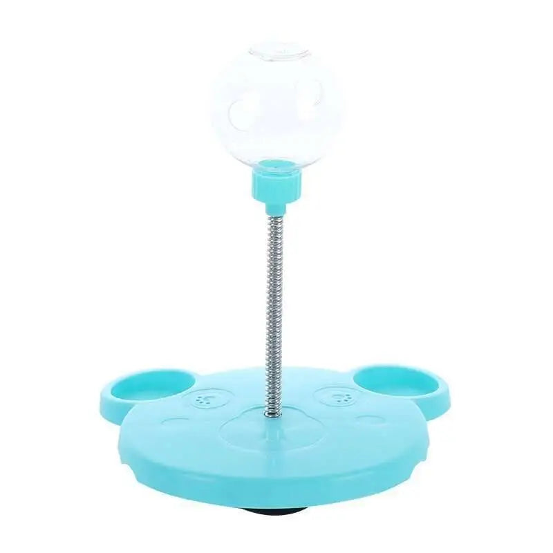 Light blue plastic panda-shaped tumbler feeder cat toy with clear water bottle and dual side bowls for pet feeding