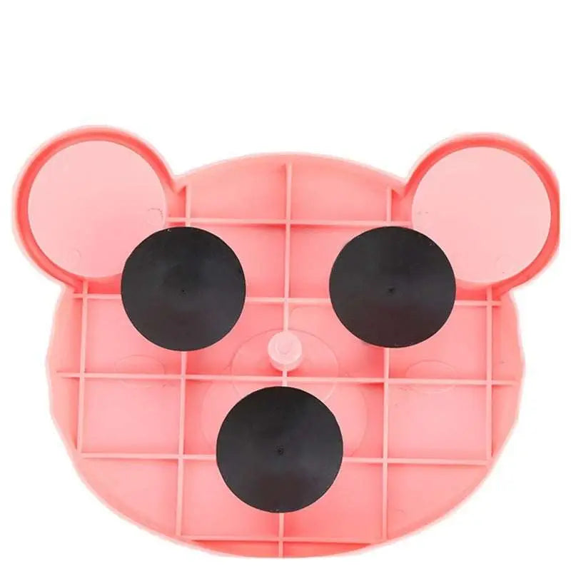 Pink plastic bear-shaped tumbler feeder cat toy with suction cup and black eyes for pet food dispensing