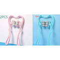 Pink and light blue plastic neck massager massage with gray textured rollers from the turquoise six wheel relieve tool