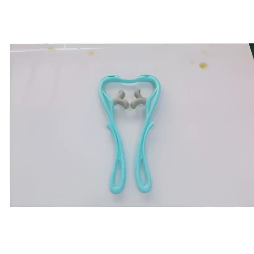 Turquoise six wheel neck massager massage tool in light blue plastic with two silver-colored massage nodes for relief