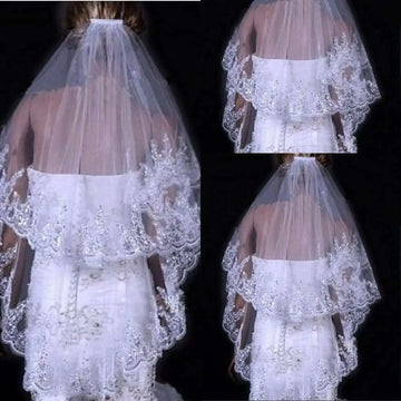 White two layer bridal sequined polyester veil with delicate lace and beaded embellishments in a tiered flowing design