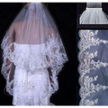 White two layer bridal sequined polyester veil with intricate floral lace embroidery and scalloped edges