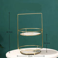 Two tier gold dressing table finishing rack by royale essence lux with gold metal frame and clear glass plates