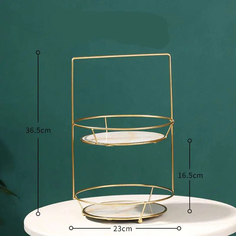 Two tier gold dressing table finishing rack by royale essence lux with gold metal frame and clear glass plates
