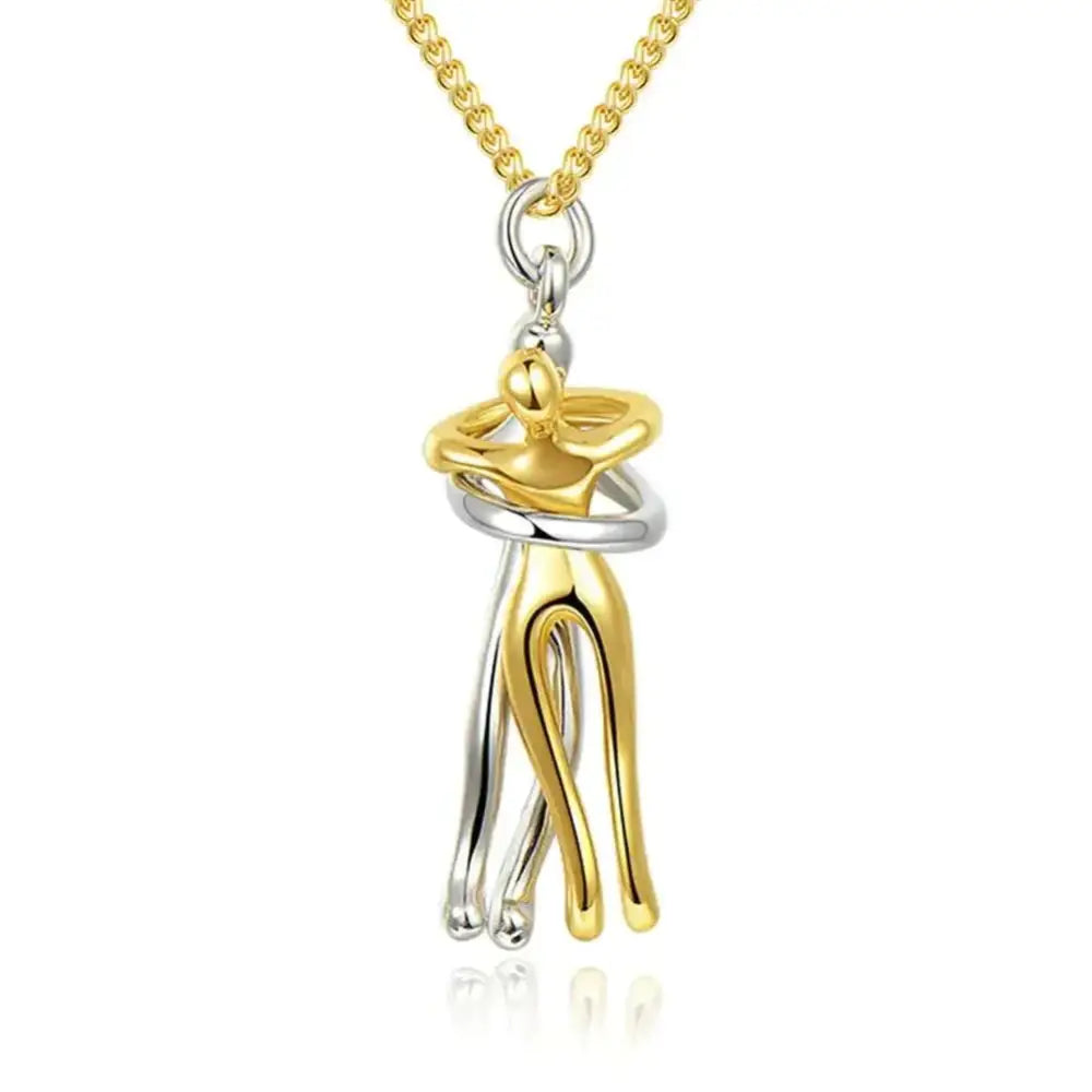 A gold and silver two tone abstract hug necklace unisex men featuring an intertwined figure design pendant