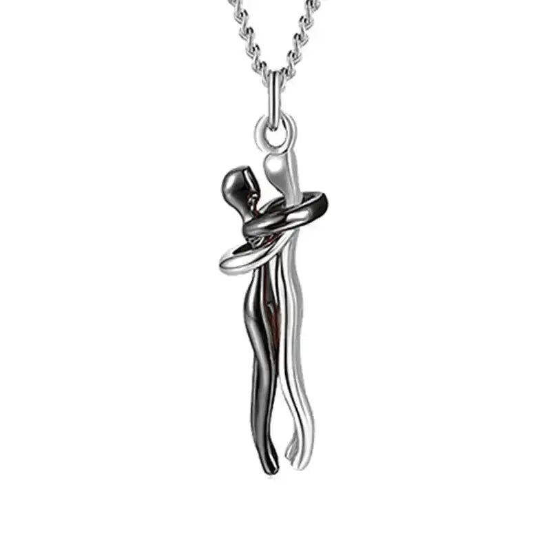 Silver two tone abstract hug necklace unisex featuring an intertwined figure design for men and women