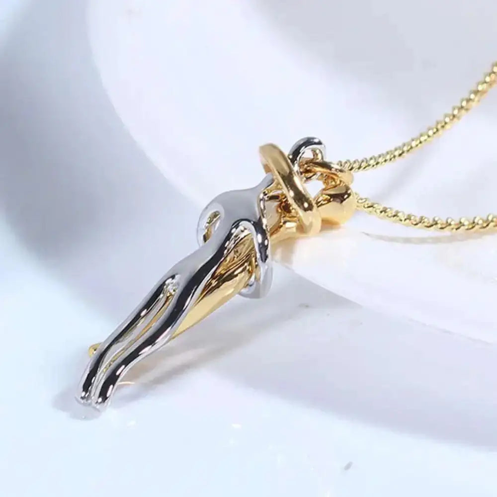 A two tone abstract hug necklace unisex men featuring a sleek gold and silver pendant with an elegant chain