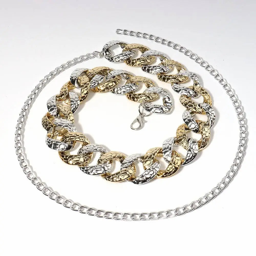 Two tone chain summer body jewelry belt featuring a chunky gold and silver reptile skin textured body jewelry belt