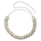 Two tone chain summer body jewelry belt featuring a gold and silver textured interlocking link design