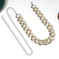 Two tone chain body jewelry belt in gold and silver with textured interlocking links for summer body jewelry use
